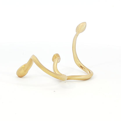 Avant-garde 18k matte yellow gold open-shank ring with 1.53ctw marquise diamonds worn across fingers size 7 by Kantor Gems