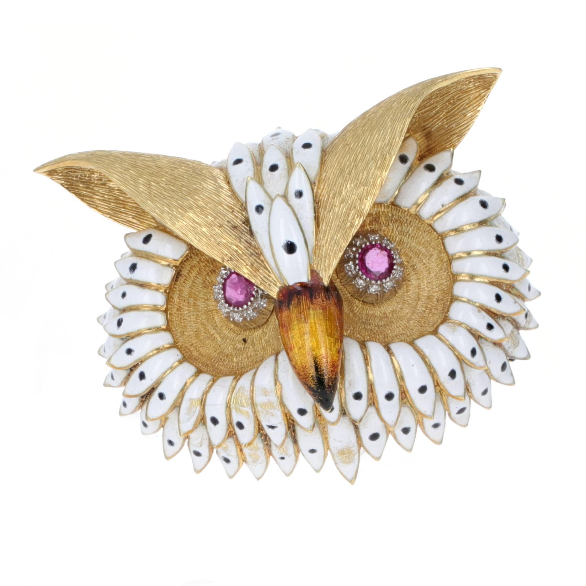 18K yellow gold owl brooch with ruby eyes and white enamel feathers, handcrafted vintage animal-motif pin featuring amber beak and detailed gold texture.