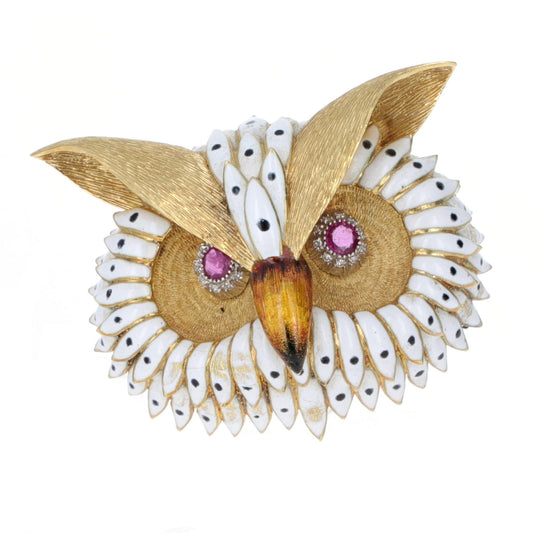 18K yellow gold owl brooch with ruby eyes and white enamel feathers, handcrafted vintage animal-motif pin featuring amber beak and detailed gold texture.