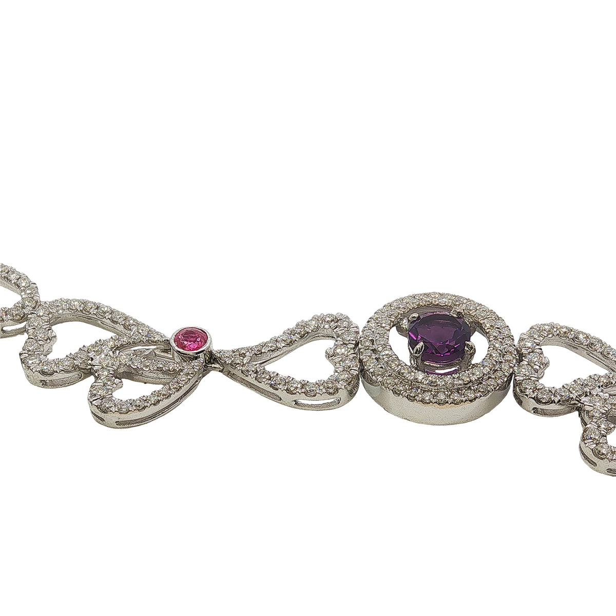 14K white gold heart necklace featuring 14.45 carats of amethysts and 9.00 carats of diamonds in an intricate openwork design.