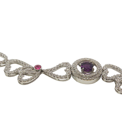 14K white gold heart necklace featuring 14.45 carats of amethysts and 9.00 carats of diamonds in an intricate openwork design.