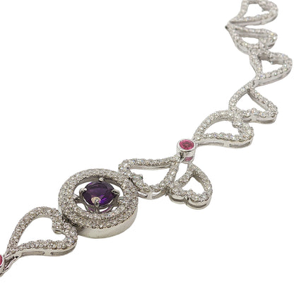 14K white gold heart necklace featuring 14.45 carats of amethysts and 9.00 carats of diamonds in an intricate openwork design.