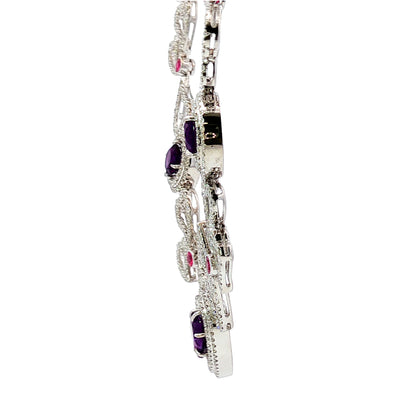 14K white gold heart necklace featuring 14.45 carats of amethysts and 9.00 carats of diamonds in an intricate openwork design.