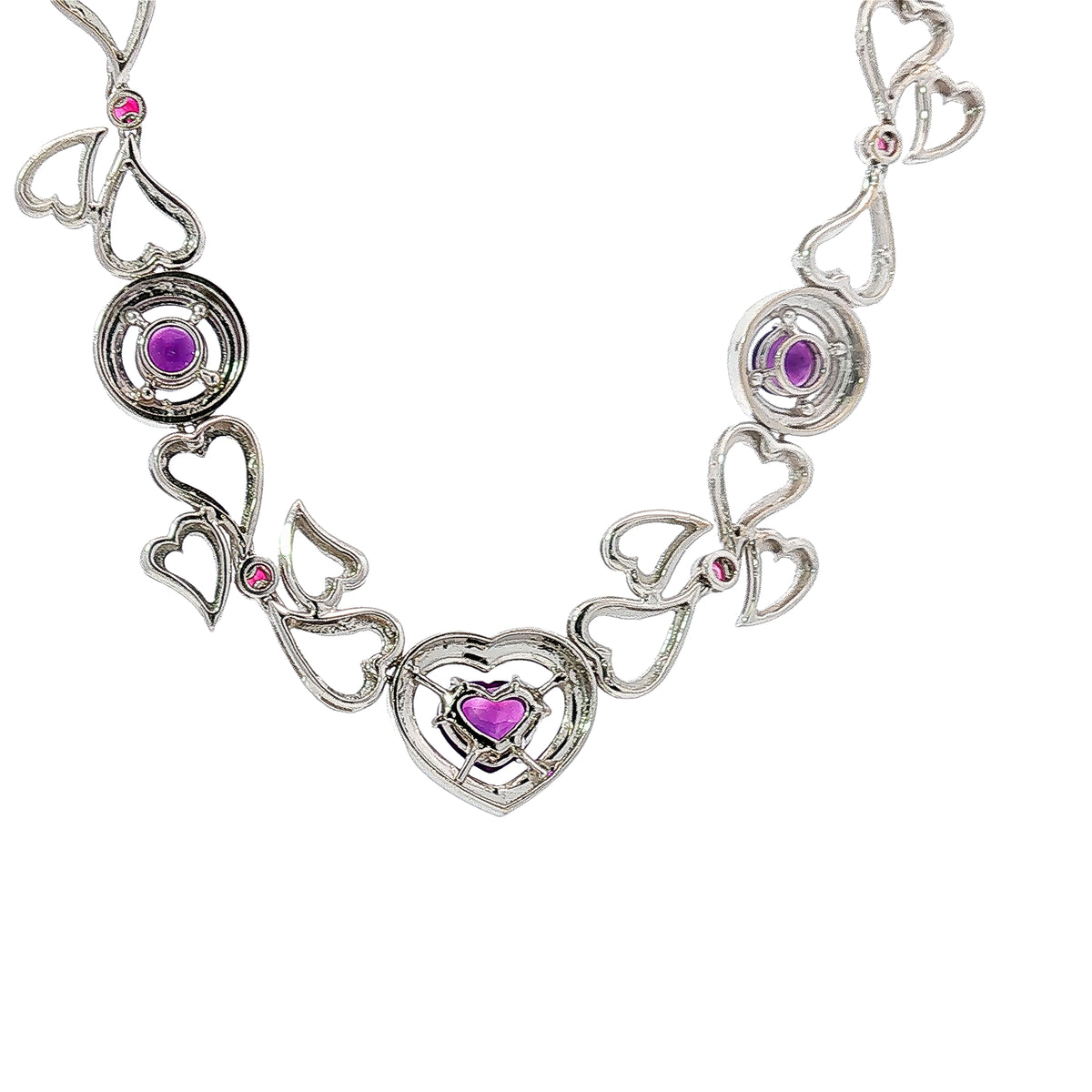 14K white gold heart necklace featuring 14.45 carats of amethysts and 9.00 carats of diamonds in an intricate openwork design.