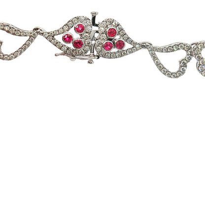 14K white gold heart necklace featuring 14.45 carats of amethysts and 9.00 carats of diamonds in an intricate openwork design.