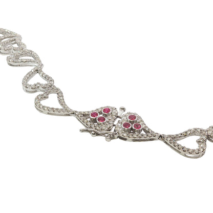 14K white gold heart necklace featuring 14.45 carats of amethysts and 9.00 carats of diamonds in an intricate openwork design.
