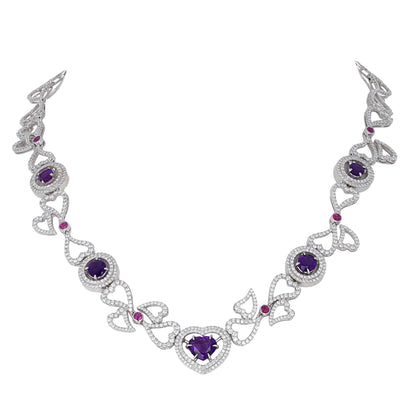14K white gold heart necklace featuring 4.45 carats of amethysts and 9.00 carats of diamonds in an intricate openwork design.