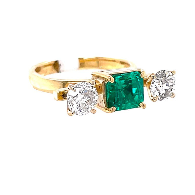 1.51 Carat Emerald and Diamond Three-Stone Ring