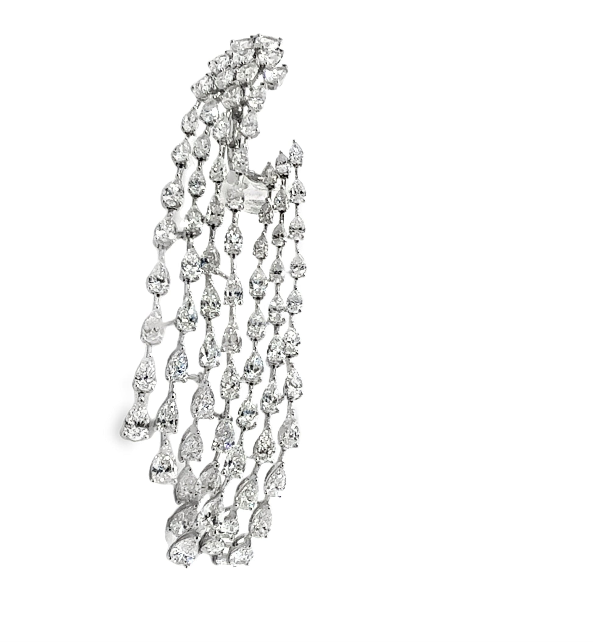 22.01 ct diamond chandelier earrings in platinum. Cascading pear-shaped diamonds create a luminous waterfall effect. Elegant and timeless.