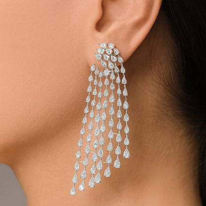 22.01 ct diamond chandelier earrings in platinum. Cascading pear-shaped diamonds create a luminous waterfall effect. Elegant and timeless.