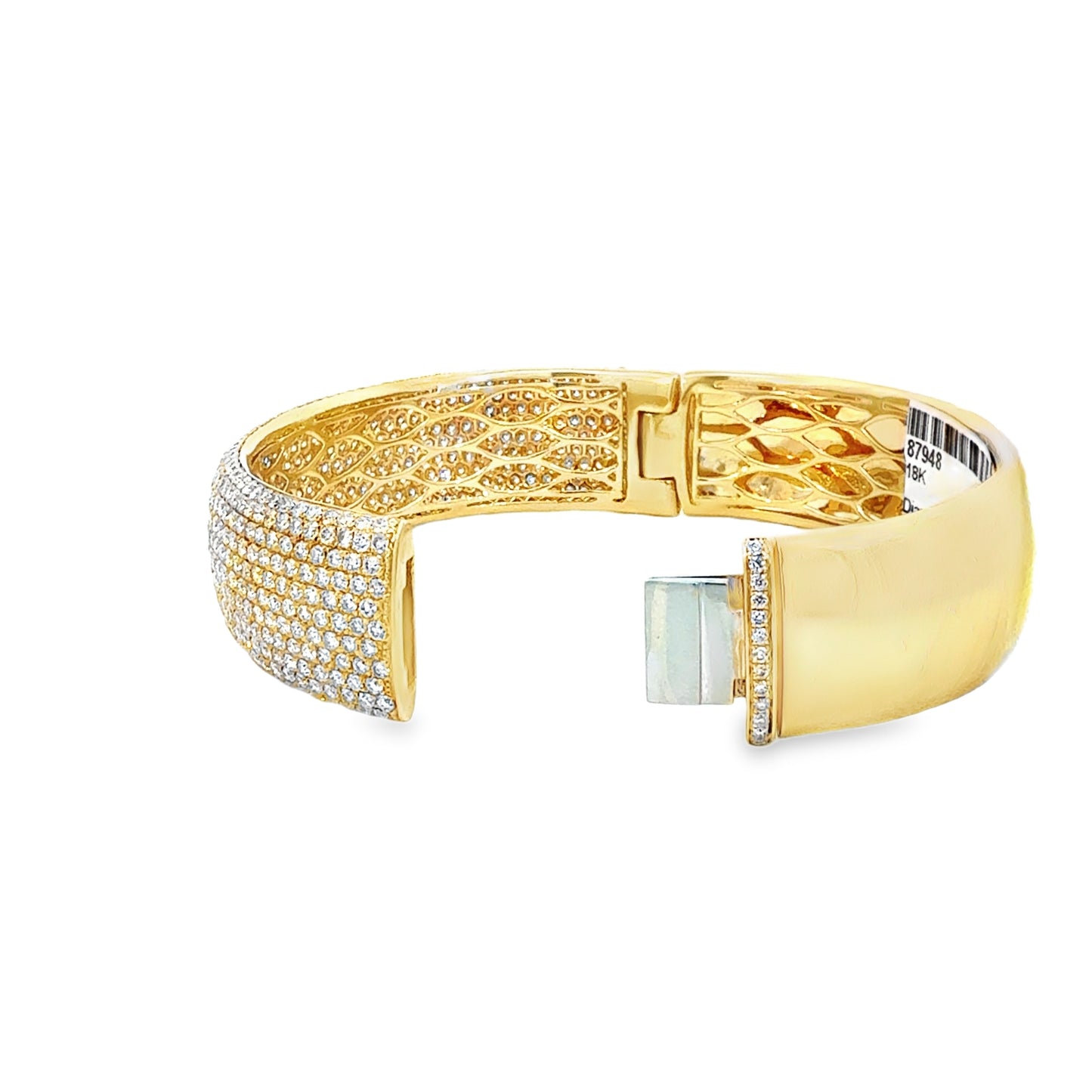 Gold bracelet with diamond accents on a white background