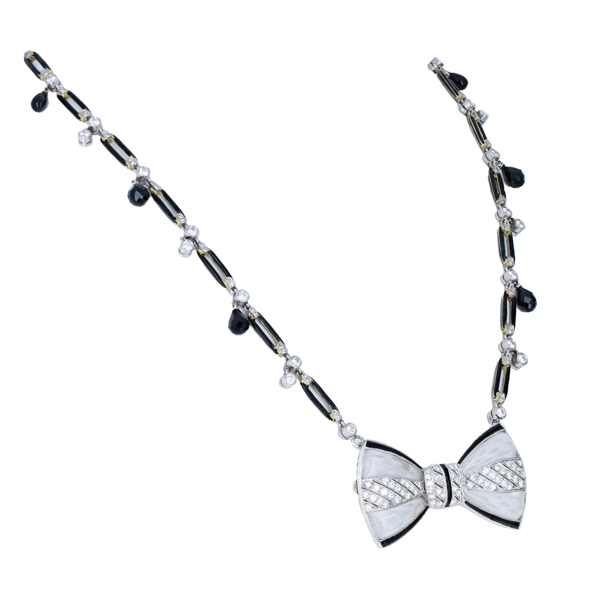 Art Deco style Fred Leyton diamond and onyx necklace with detachable rock crystal bow brooch, 18K white and yellow gold.