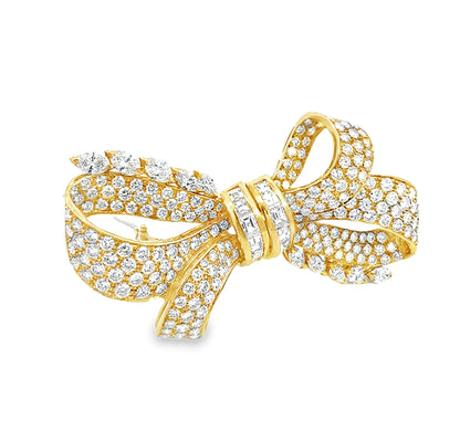 Vintage 18K yellow gold Retro diamond bow brooch featuring 238 round brilliant, pear-shaped, and baguette-cut diamonds totaling approximately 19.50 carats.