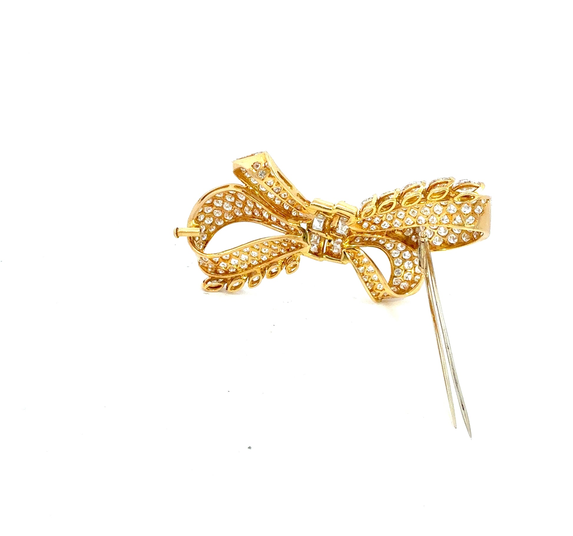 Vintage 18K yellow gold Retro diamond bow brooch featuring 238 round brilliant, pear-shaped, and baguette-cut diamonds totaling approximately 19.50 carats.