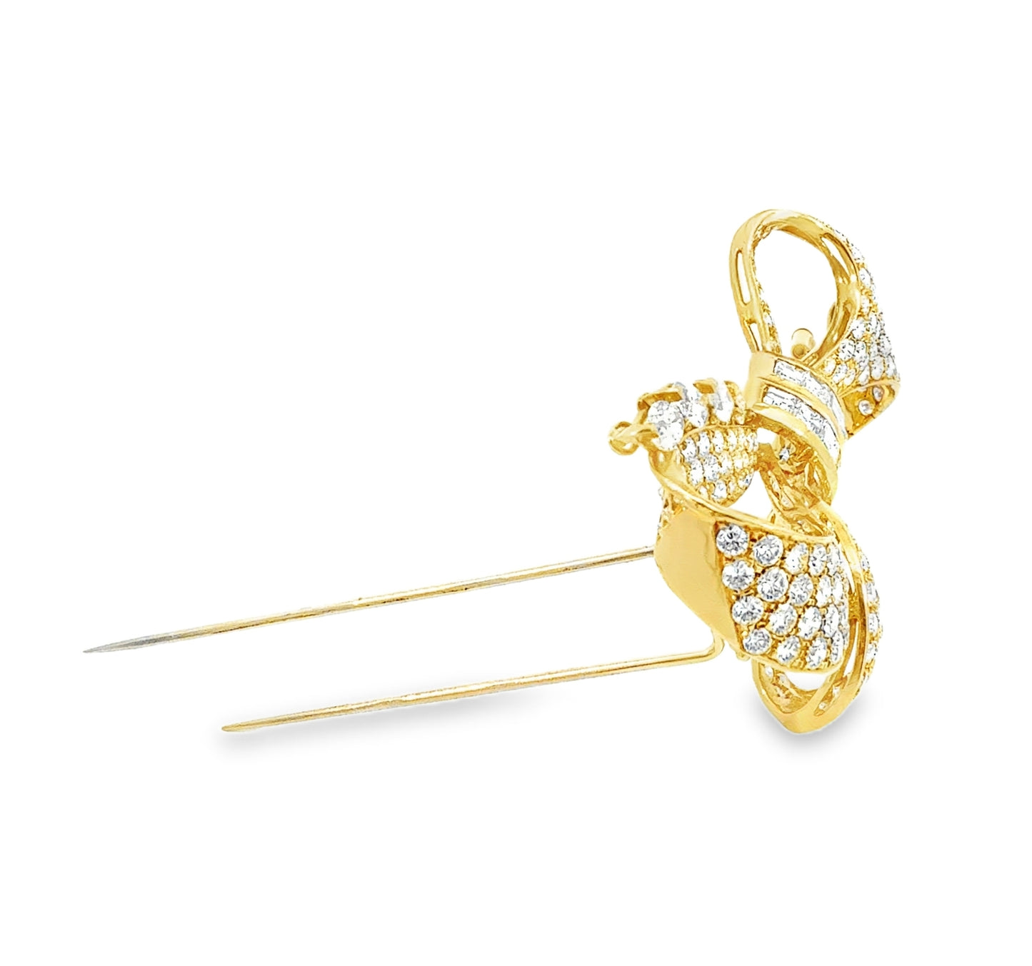 Vintage 18K yellow gold Retro diamond bow brooch featuring 238 round brilliant, pear-shaped, and baguette-cut diamonds totaling approximately 19.50 carats.