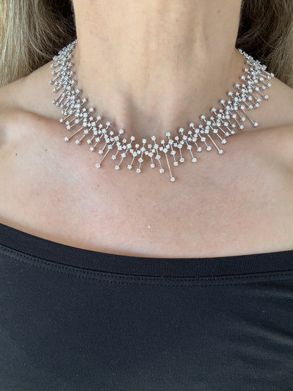 15.50 carat round brilliant diamond fringe chandelier necklace in 18K white gold featuring articulated geometric bars and graduated diamond drops.
