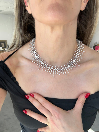 15.50 carat round brilliant diamond fringe chandelier necklace in 18K white gold featuring articulated geometric bars and graduated diamond drops.