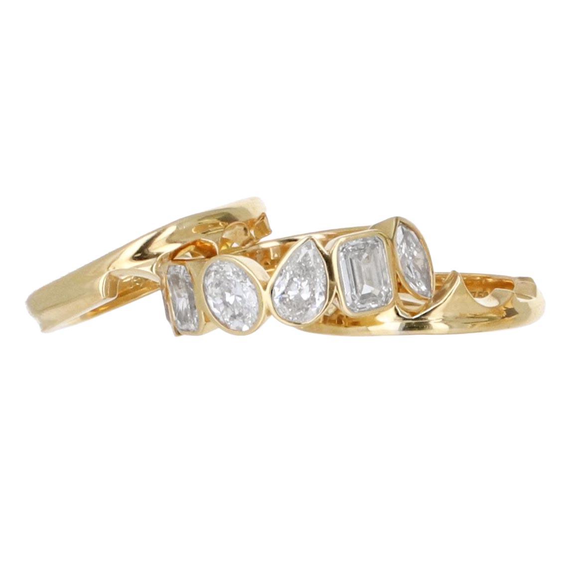 18k yellow gold 3 pc ring set with diamonds. 24.5g.