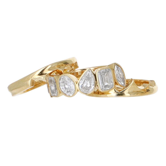 18k yellow gold 3 pc ring set with diamonds. 24.5g.