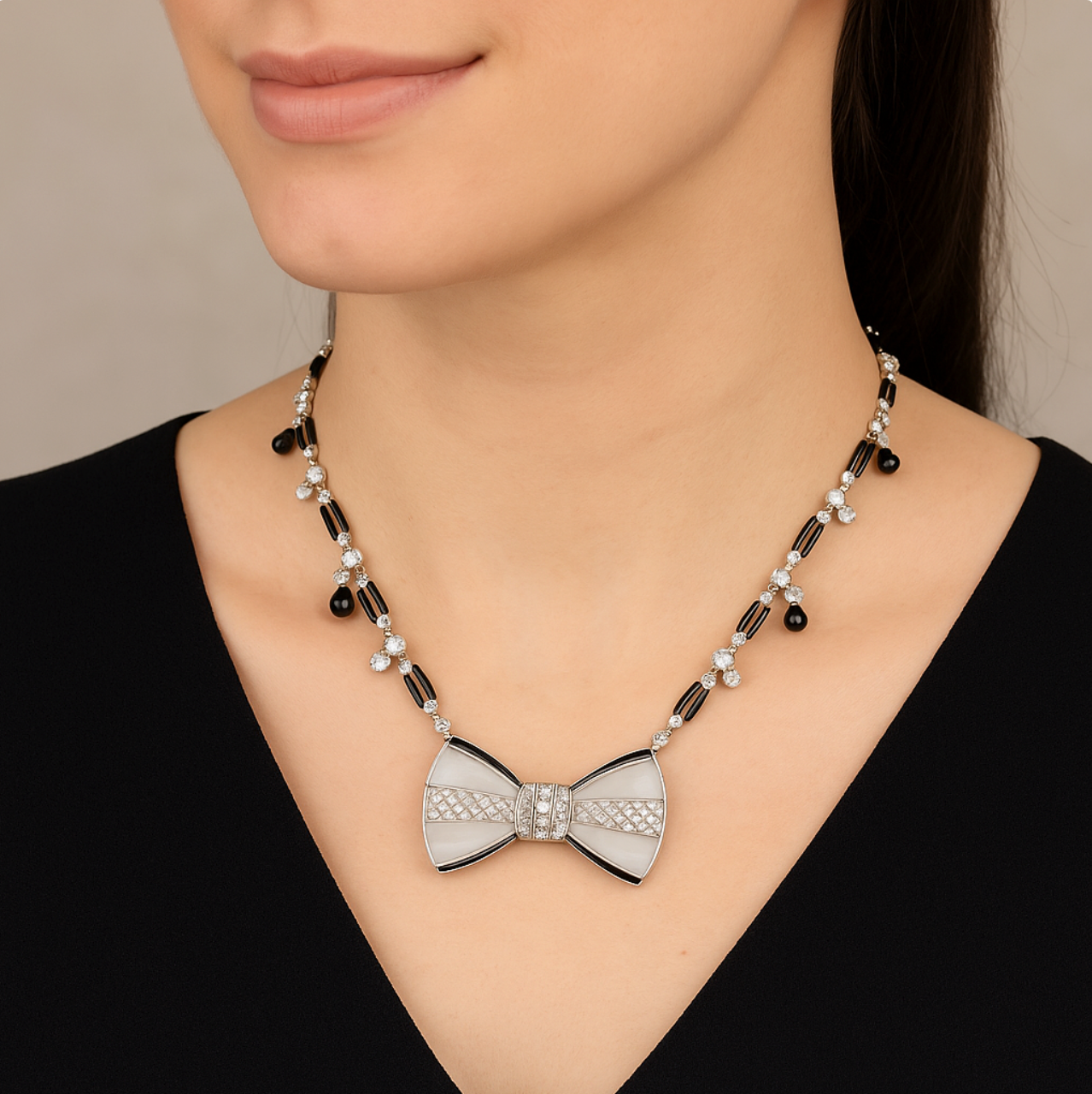 Fred Leyton diamond onyx and rock crystal bow necklace in 18K white and yellow gold, Art Deco revival design, detachable bow brooch.