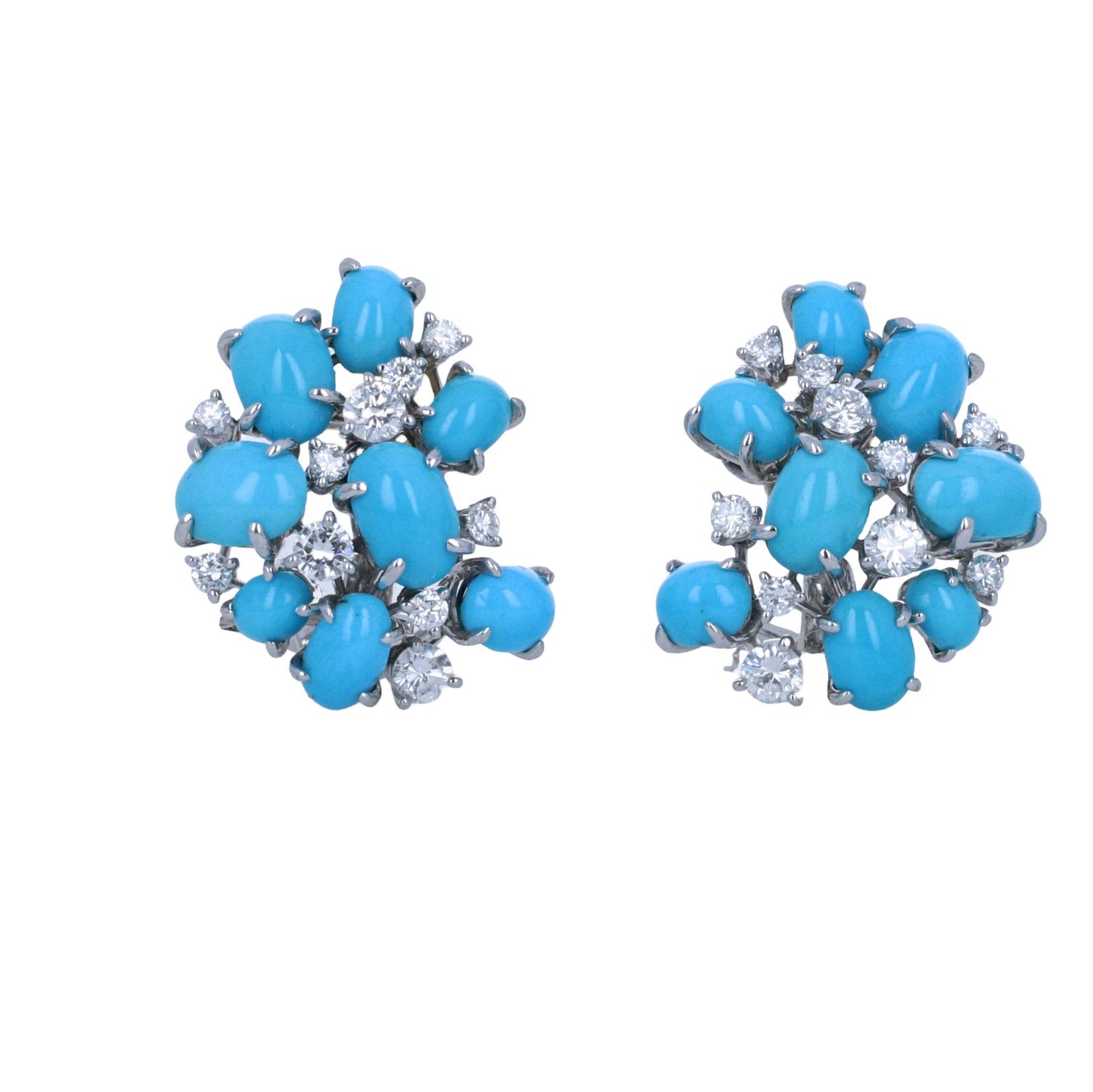 A pair of turquoise stud earrings with silver-toned metal settings, featuring round and oval turquoise cabochons accented with small clear cubic zirconia stones, shown on a plain white background.