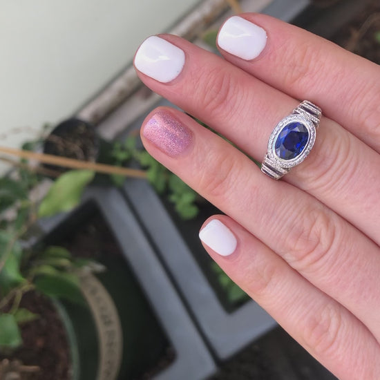 3.54ct no-heat Ceylon blue sapphire east-west ring with 0.46 ctw diamonds with multi-tiered diamond split band AGL Certified