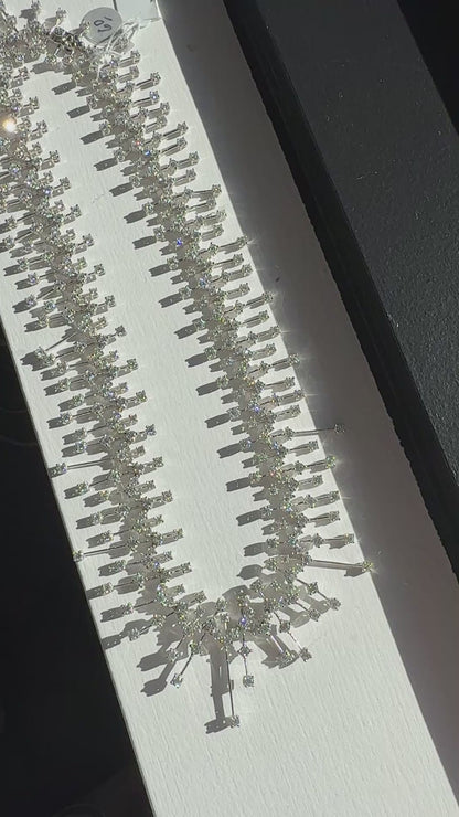 15.50 carat round brilliant diamond fringe chandelier necklace in 18K white gold featuring articulated geometric bars and graduated diamond drops.